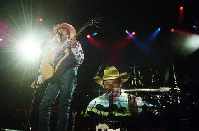 April 18, 1999: George Strait performs at the George Strait Summer Country Music Festival at Texas Stadium.